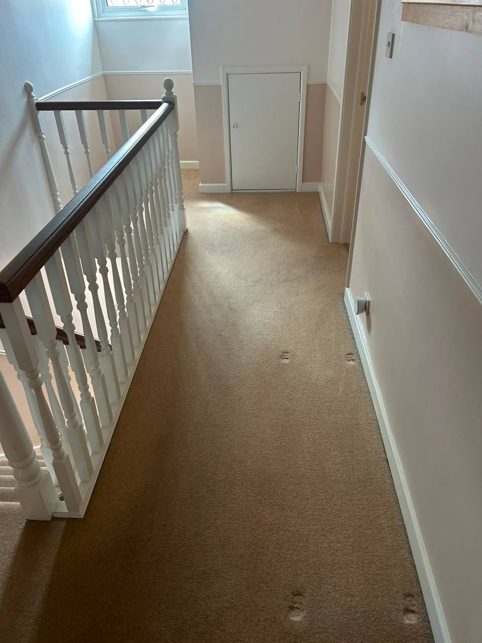 Upper landing with white spindles