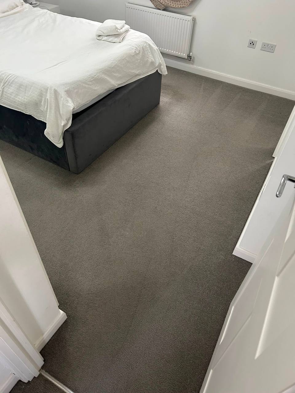 Bedroom with grey carpet